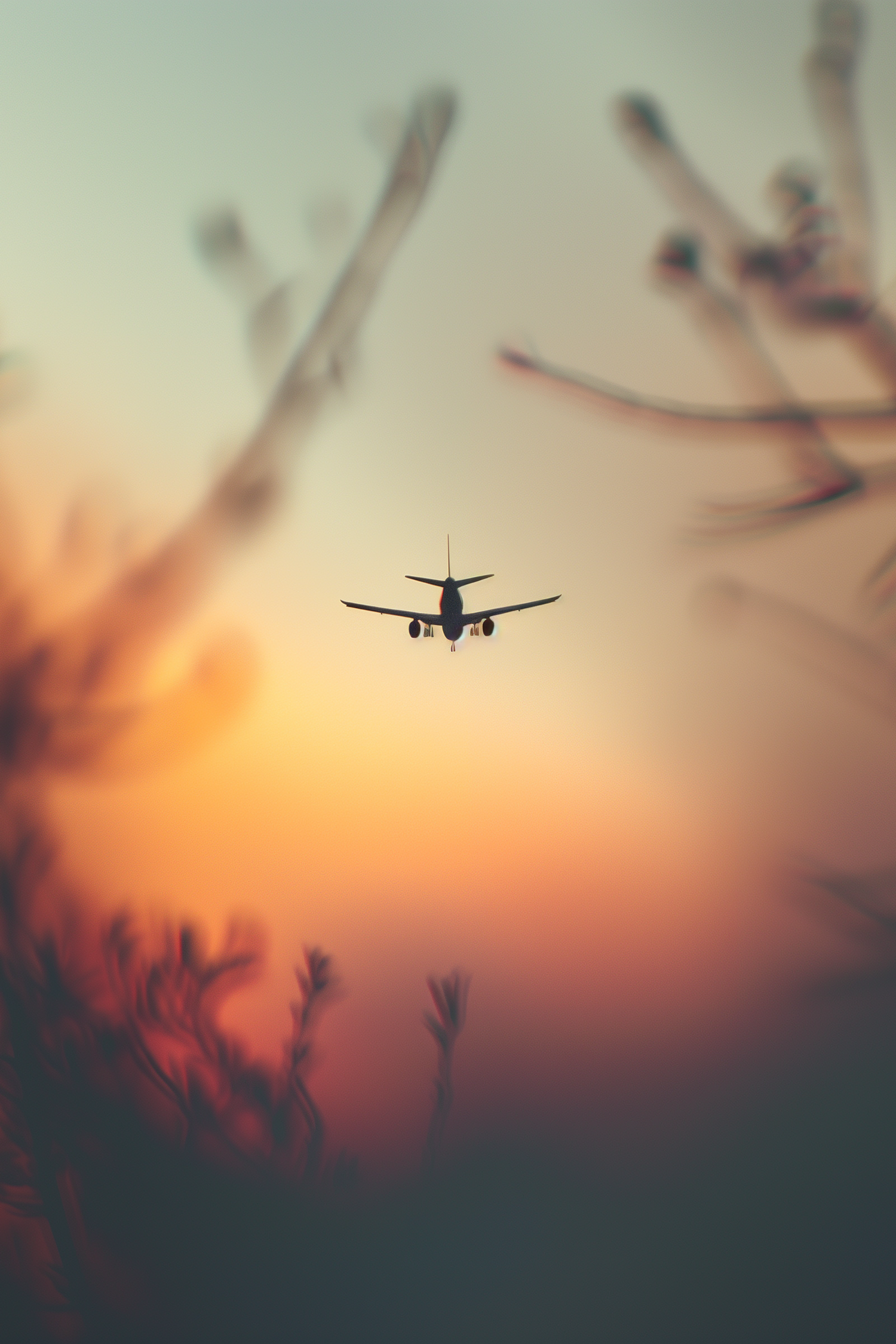 Miniature toy airplane in sky